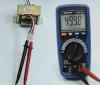 Compact Aktakom AMM-1032 digital True RMS multimeter with autoranging 